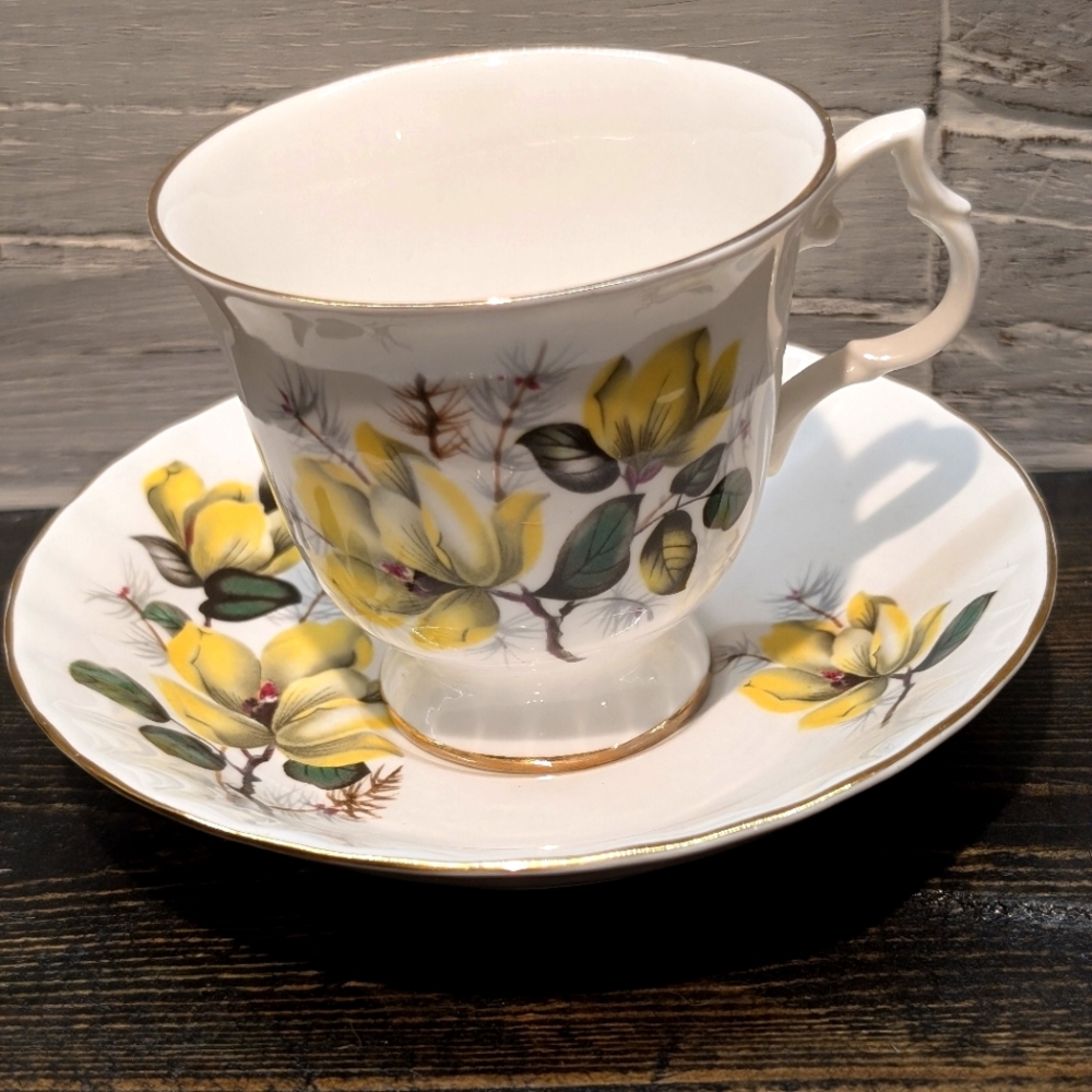 Vintage Bluebird footed tea cup and saucer